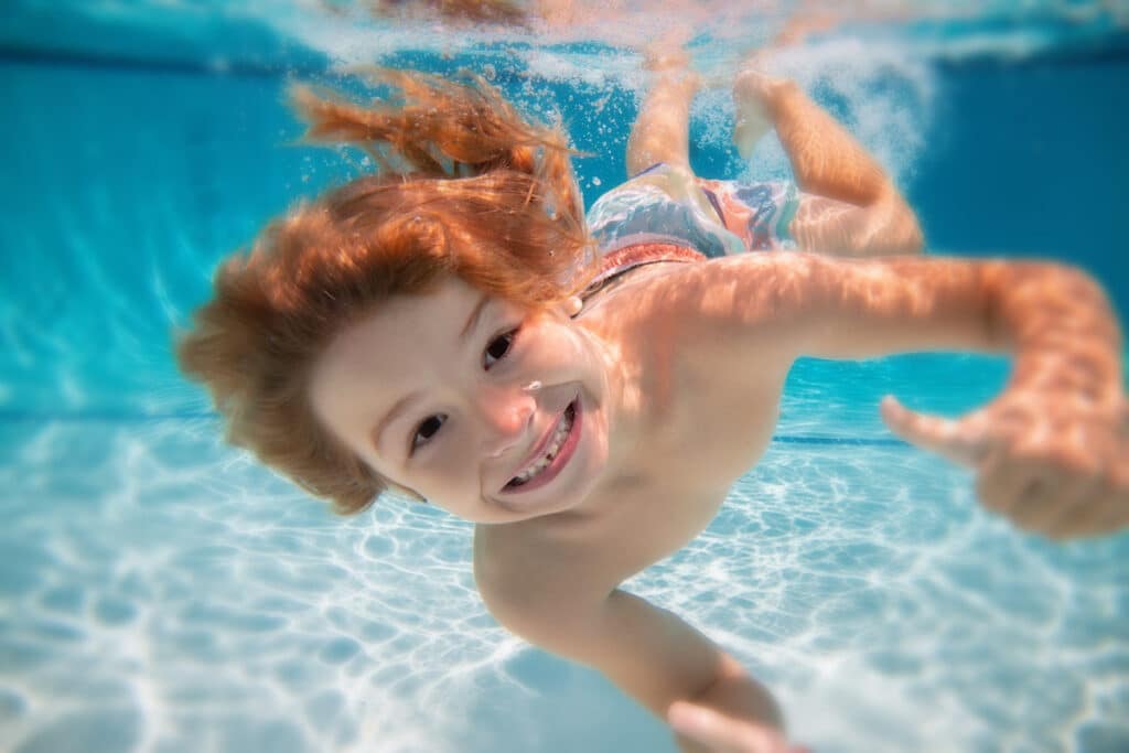 Children enjoying a swim lesson at Hudson Valley Swim® pool.